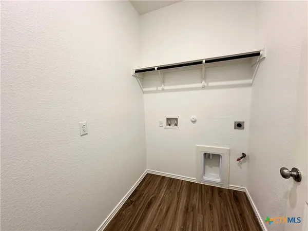a view of small space with racks on the wall