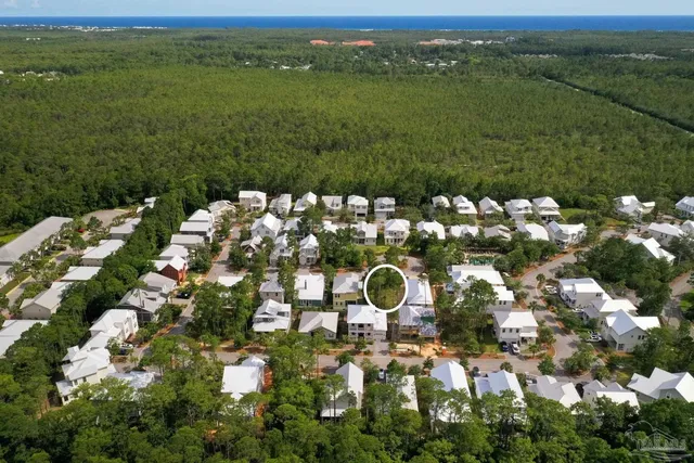 an aerial view of a house with outdoor space