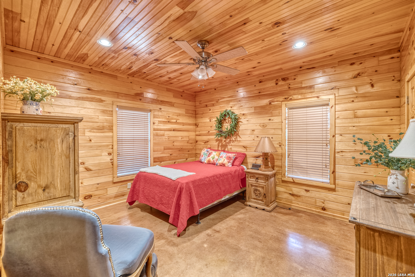 206 South River Pl Road Rio Frio, TX 78879 - Photo 9 of 14 a bedroom with a bed and wooden floor