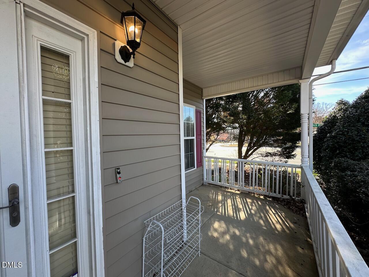 2125 Star Sapphire Drive Raleigh, NC 27610 - Photo 2 of 25 a view of balcony with small garden