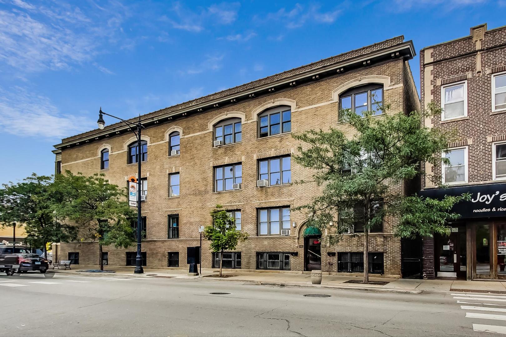 3263 North Broadway, Unit 3 Chicago, IL 60657 - Photo 11 of 37 front view of a building with a road
