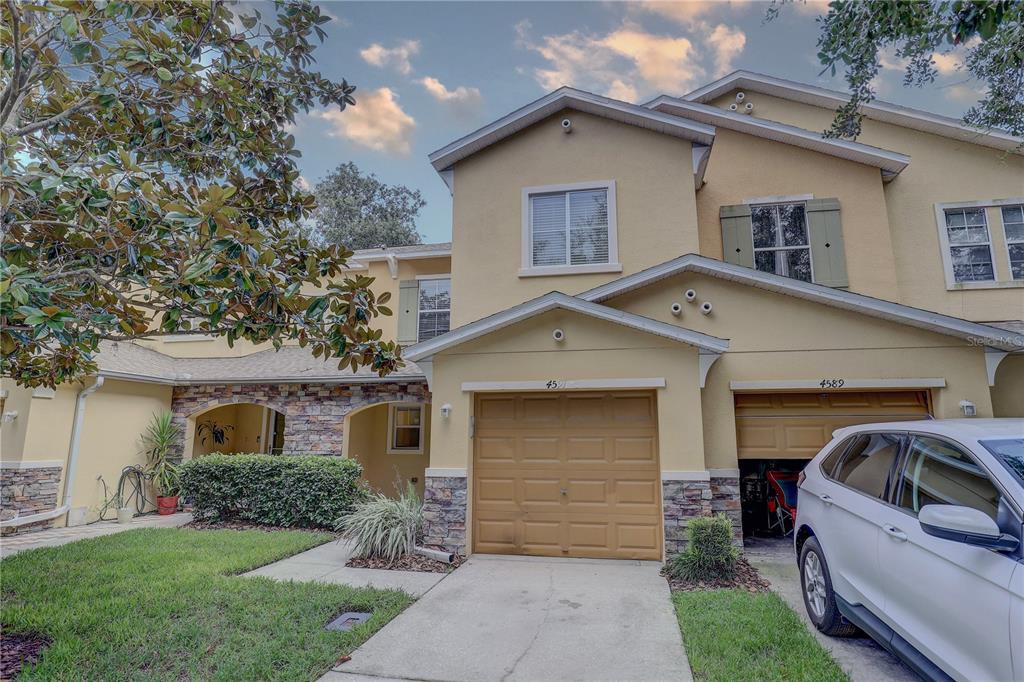 4591 Limerick Drive Tampa, FL 33610 - Photo 1 of 1 front view of a house with a yard