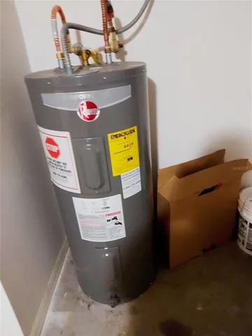 a kitchen with granite countertop a sink and cabinets
