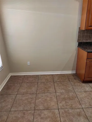 a bathroom with a toilet and a bathtub