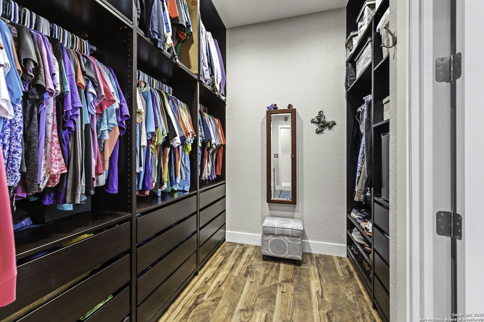 1119 Sunrise Place Spring Branch, TX 78070 - Photo 16 of 53 a view of walk in closet with clothes and shoes