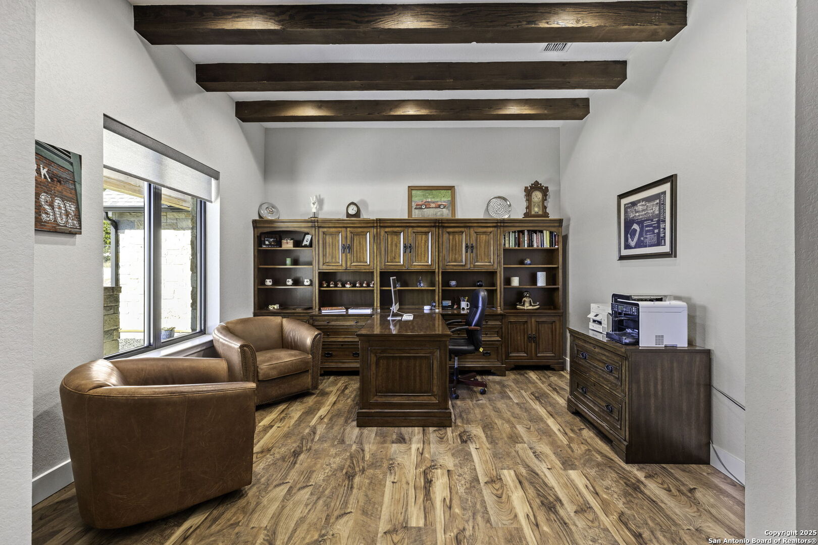 1119 Sunrise Place Spring Branch, TX 78070 - Photo 23 of 53 a living room with furniture a rug and a book shelf