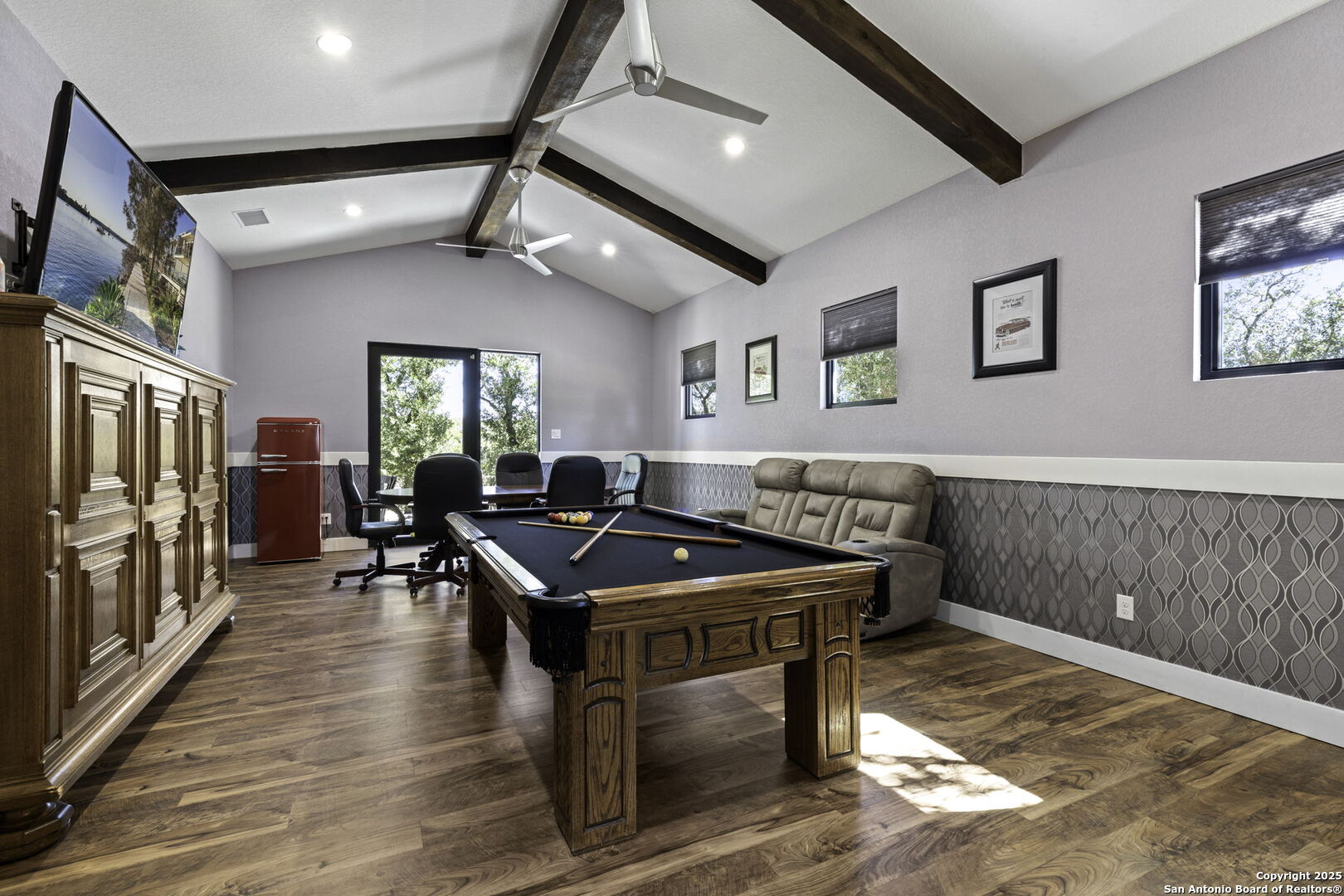 1119 Sunrise Place Spring Branch, TX 78070 - Photo 24 of 53 a living room with furniture a flat screen tv and a table