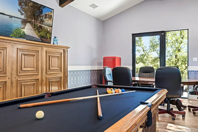 a bathroom with a toilet a sink and a mirror