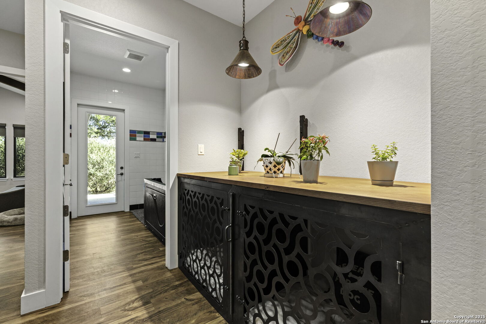 1119 Sunrise Place Spring Branch, TX 78070 - Photo 29 of 53 a kitchen with a sink a counter space and wooden floor