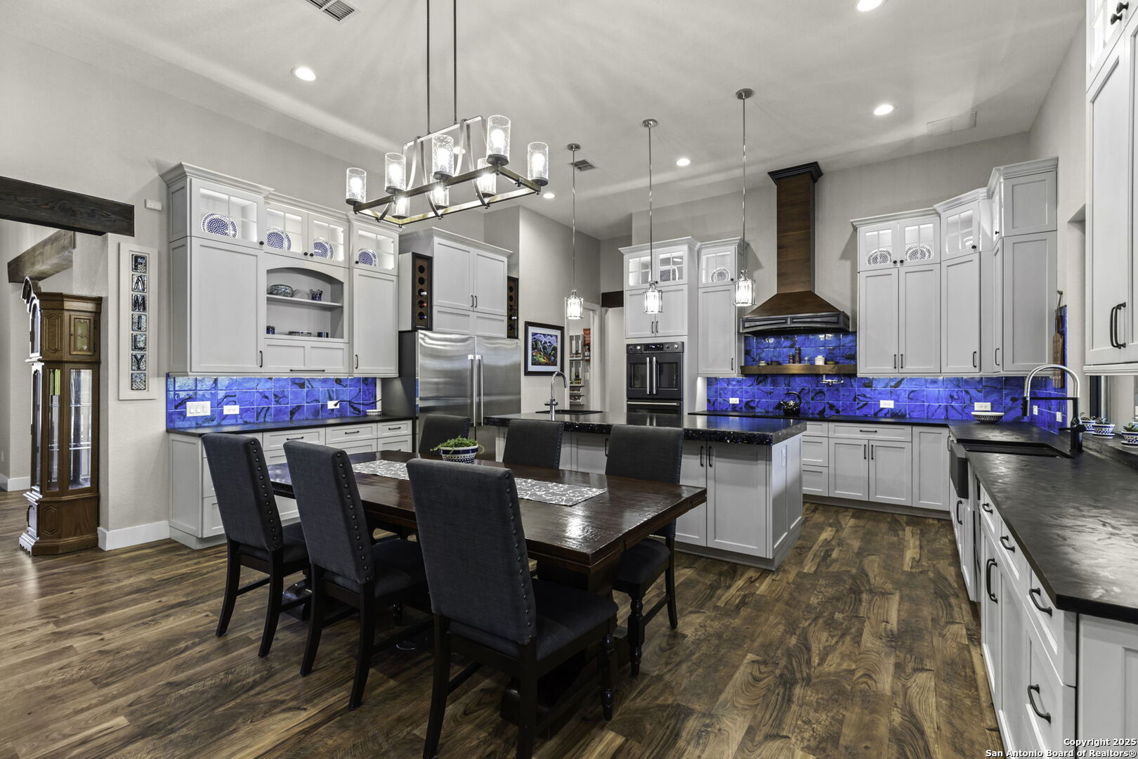 1119 Sunrise Place Spring Branch, TX 78070 - Photo 35 of 53 a view of a dining room with furniture and wooden floor