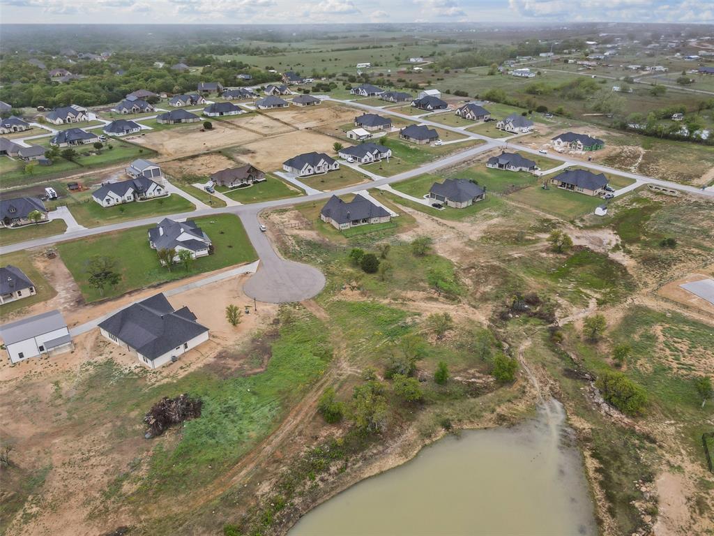 709 Gilbert Court Azle, TX 76020 - Photo 11 of 14 an aerial view of residential houses with outdoor space