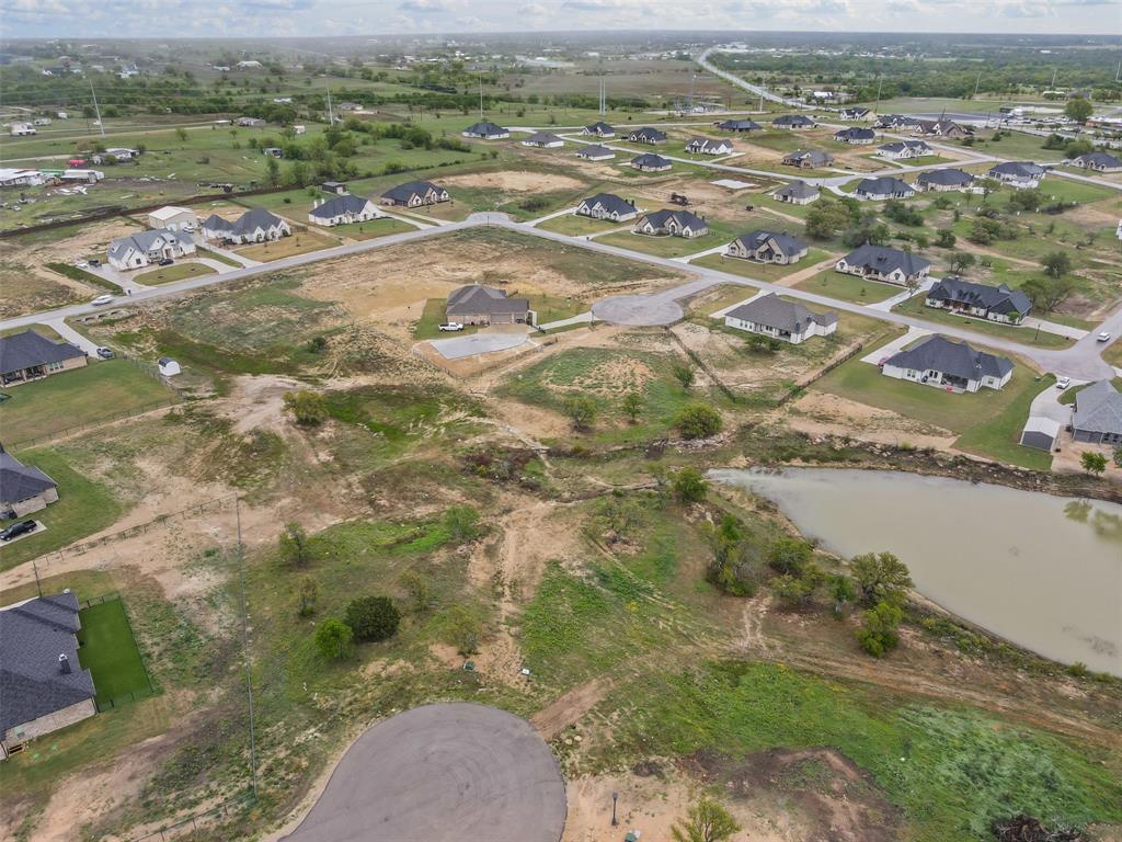 709 Gilbert Court Azle, TX 76020 - Photo 12 of 14 an aerial view of residential houses with outdoor space