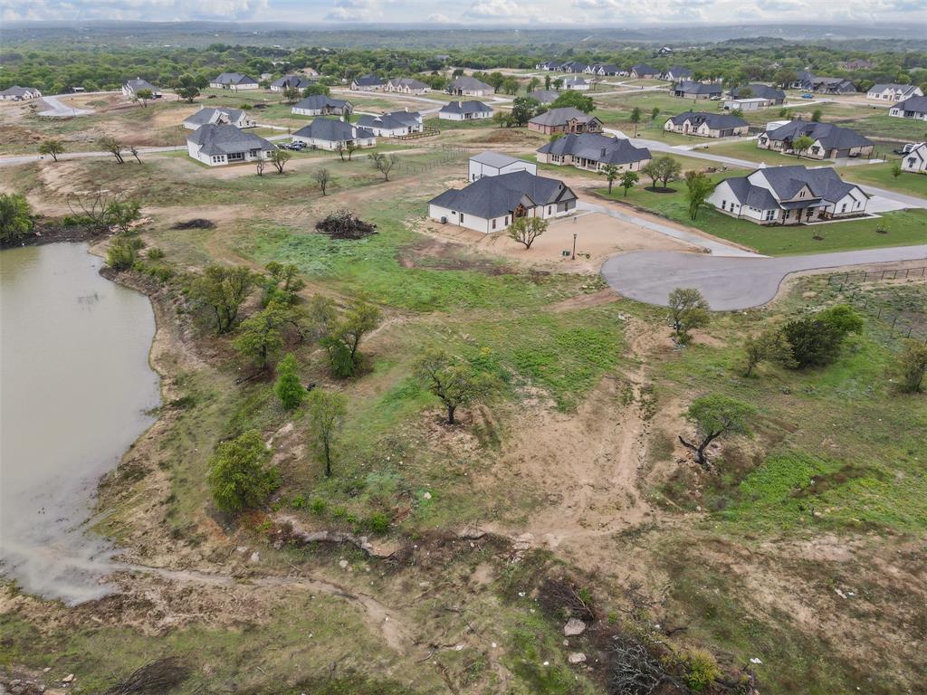 709 Gilbert Court Azle, TX 76020 - Photo 7 of 14 an aerial view of residential houses with outdoor space