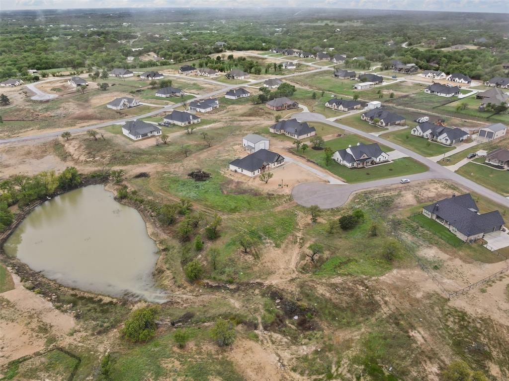 709 Gilbert Court Azle, TX 76020 - Photo 8 of 14 an aerial view of residential houses with outdoor space