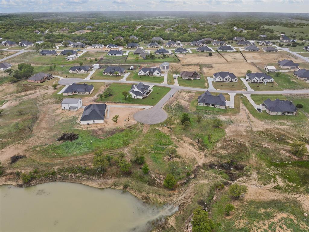 709 Gilbert Court Azle, TX 76020 - Photo 9 of 14 an aerial view of residential houses with outdoor space
