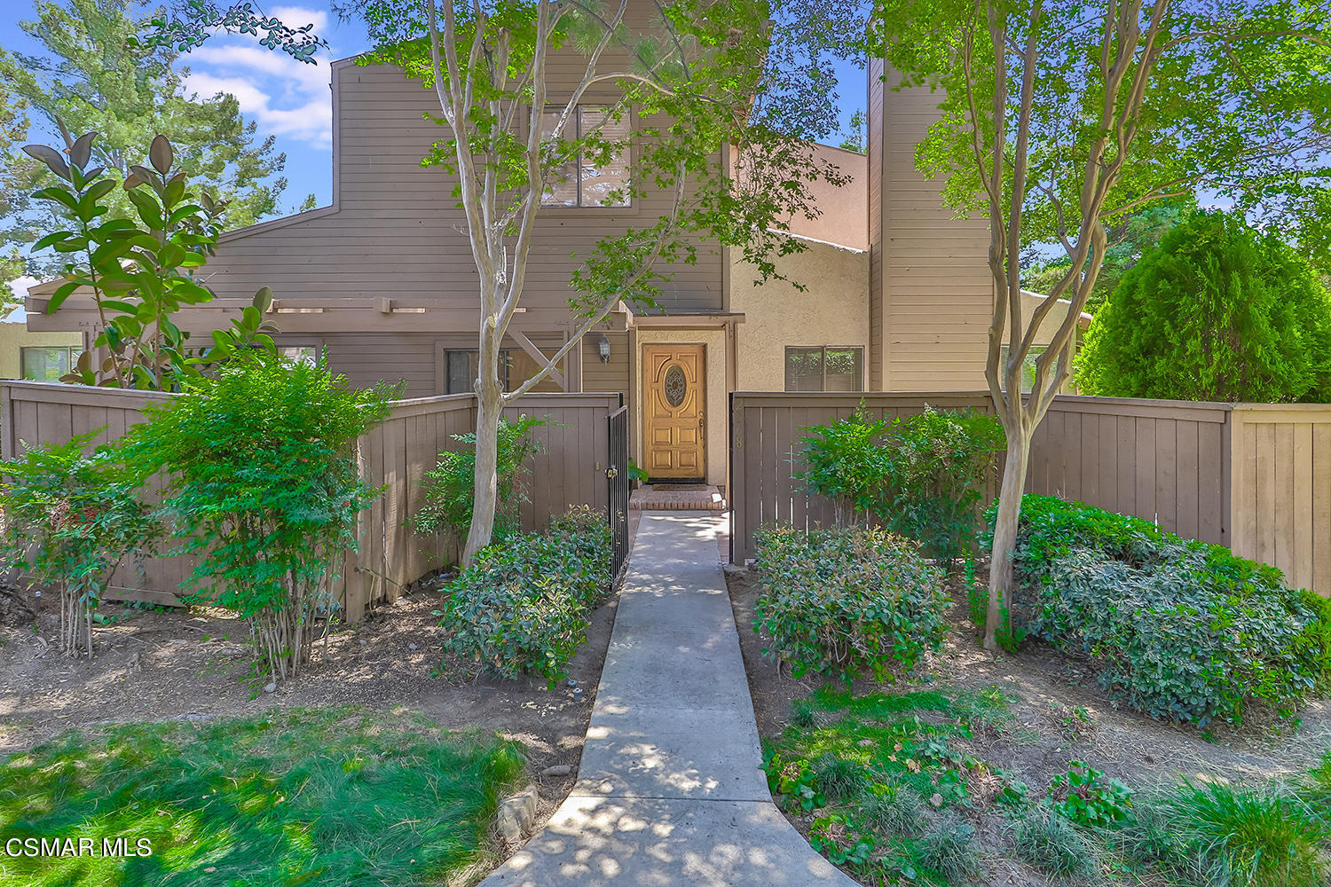 2068 Emory Avenue Simi Valley, CA 93063 - Photo 1 of 35 a view of a pathway with house on both side