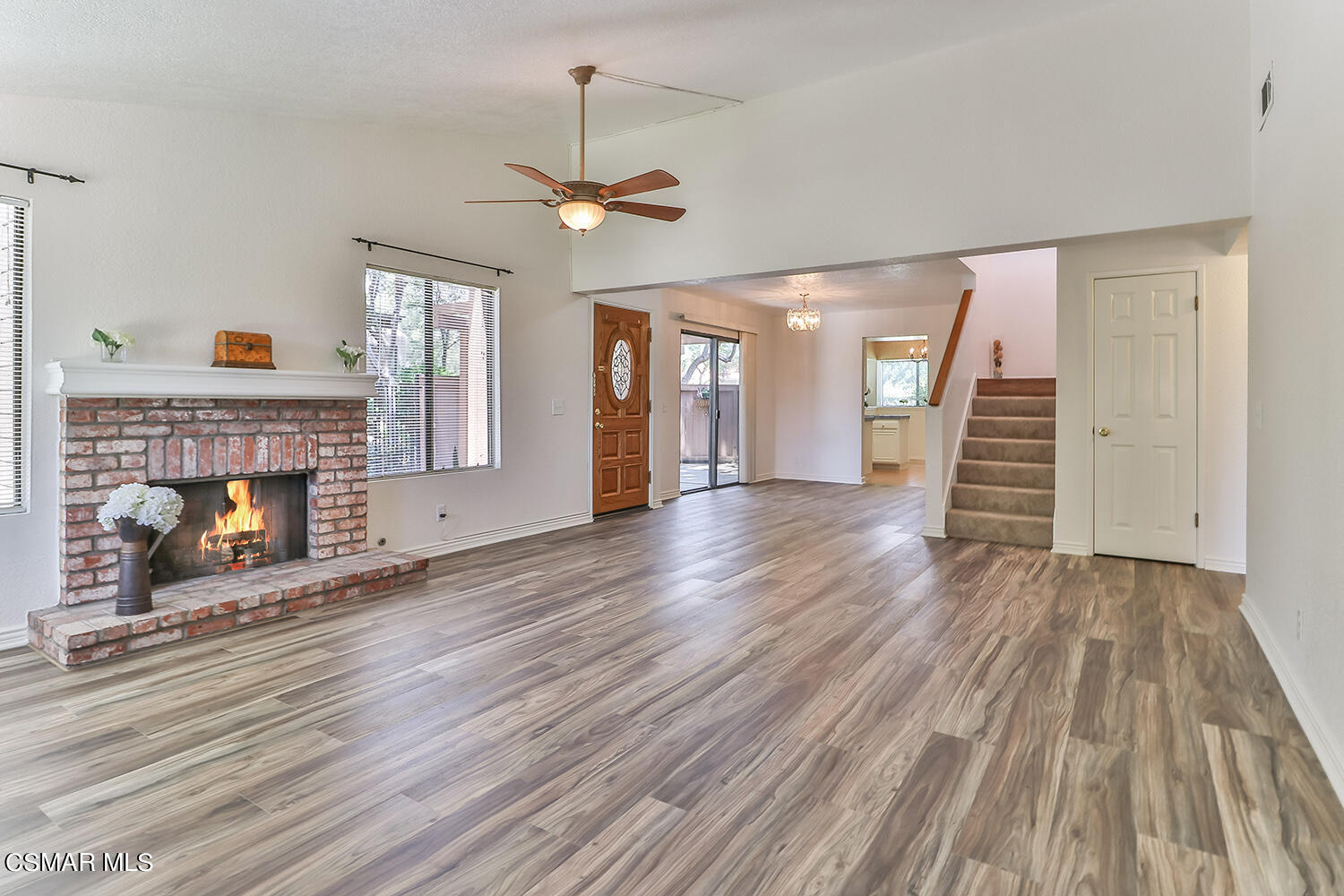 2068 Emory Avenue Simi Valley, CA 93063 - Photo 13 of 35 a view of a livingroom with wooden floor and a fireplace