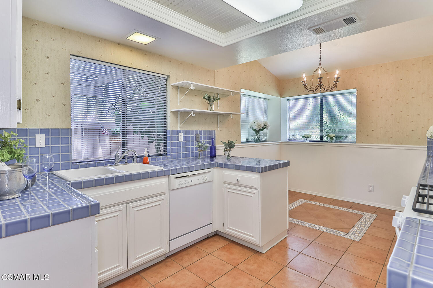 2068 Emory Avenue Simi Valley, CA 93063 - Photo 15 of 35 a kitchen with granite countertop a sink stainless steel appliances and cabinets