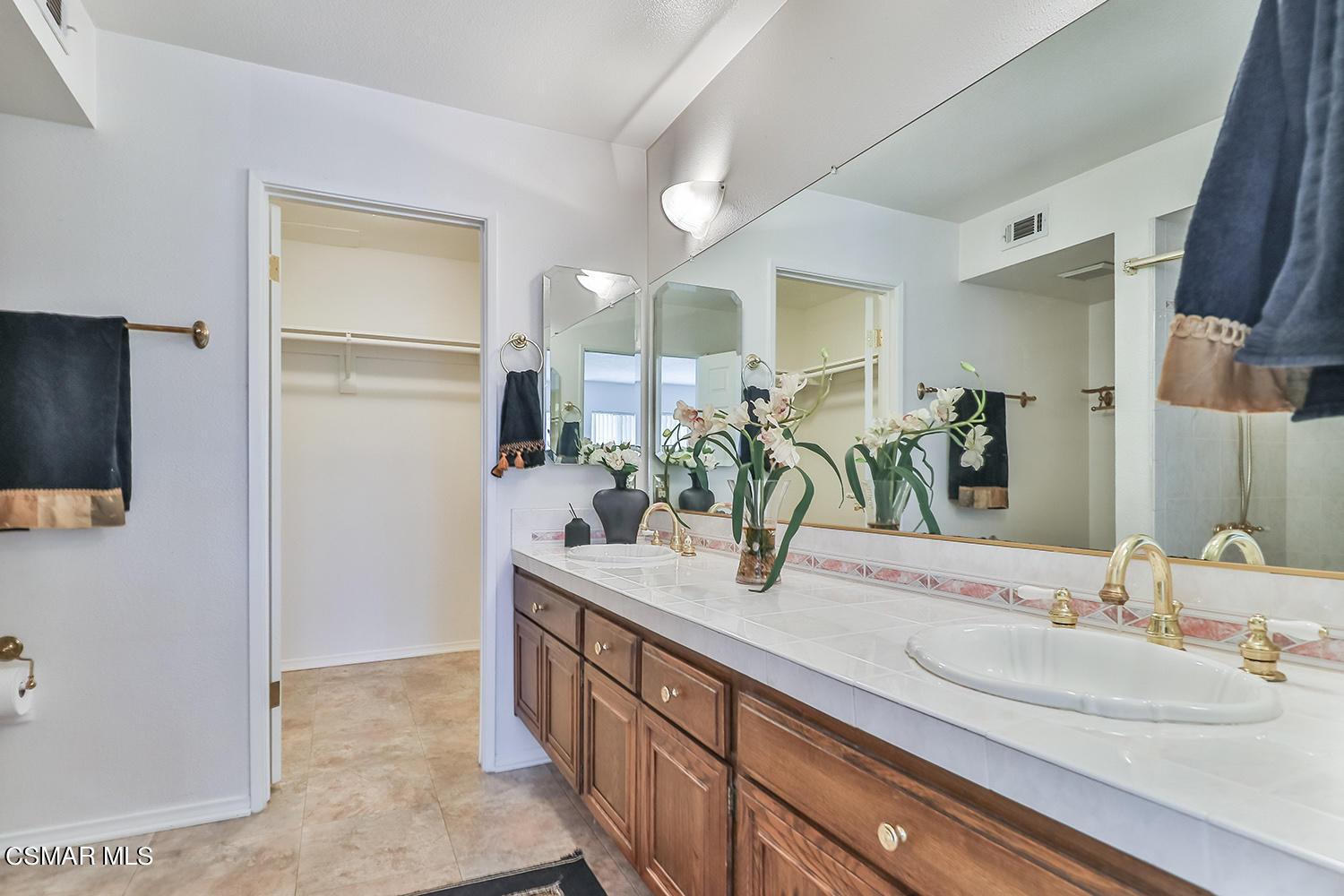 2068 Emory Avenue Simi Valley, CA 93063 - Photo 22 of 35 a bathroom with a sink and a mirror