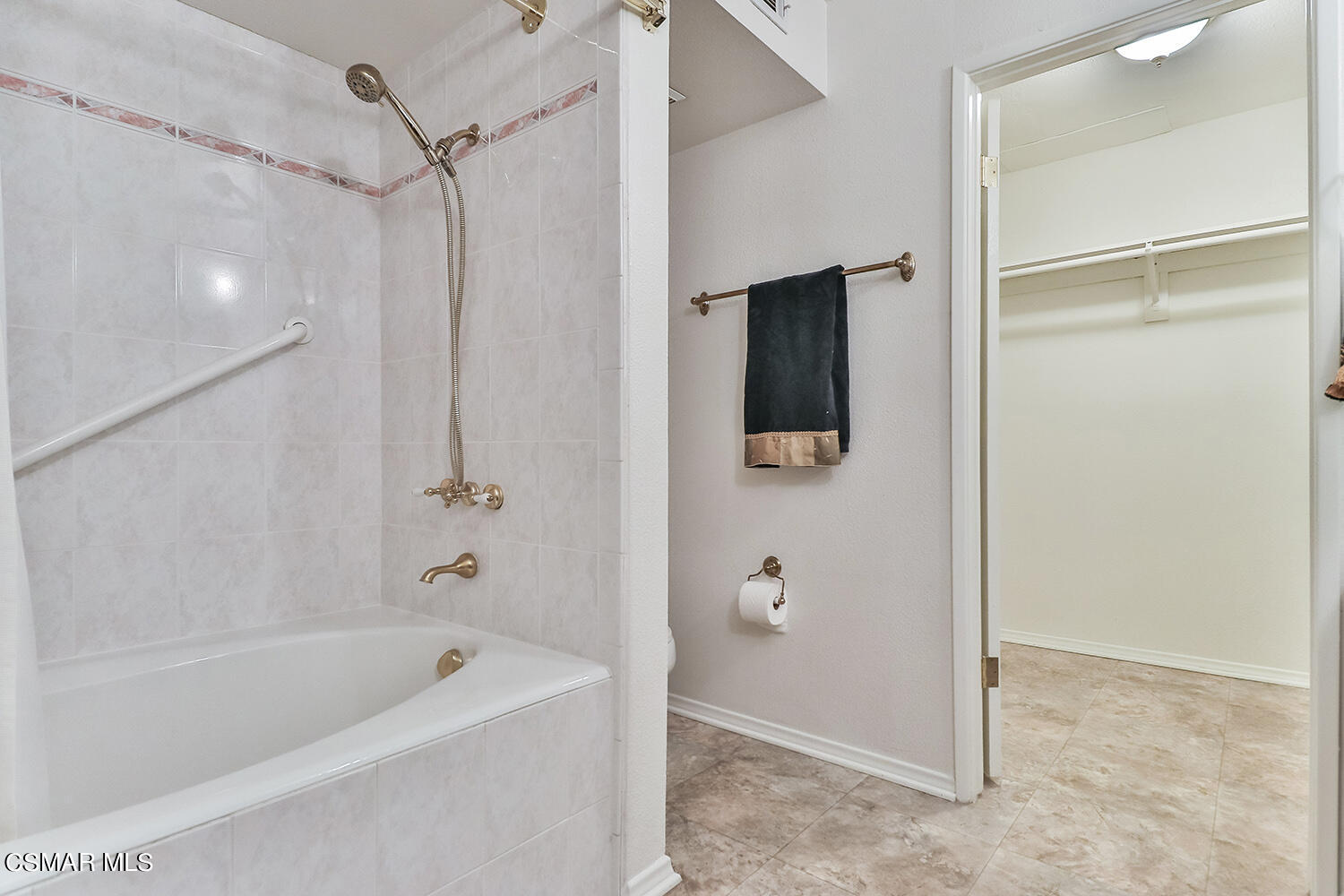 2068 Emory Avenue Simi Valley, CA 93063 - Photo 24 of 35 a bathroom with a tub a toilet and a shower