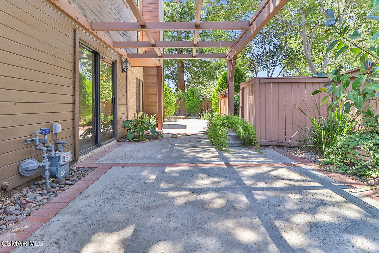 2068 Emory Avenue Simi Valley, CA 93063 - Photo 4 of 35 a view of backyard with plants and outdoor seating