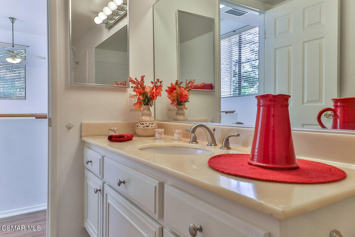 2068 Emory Avenue Simi Valley, CA 93063 - Photo 31 of 35 a bathroom with a double vanity sink and shower