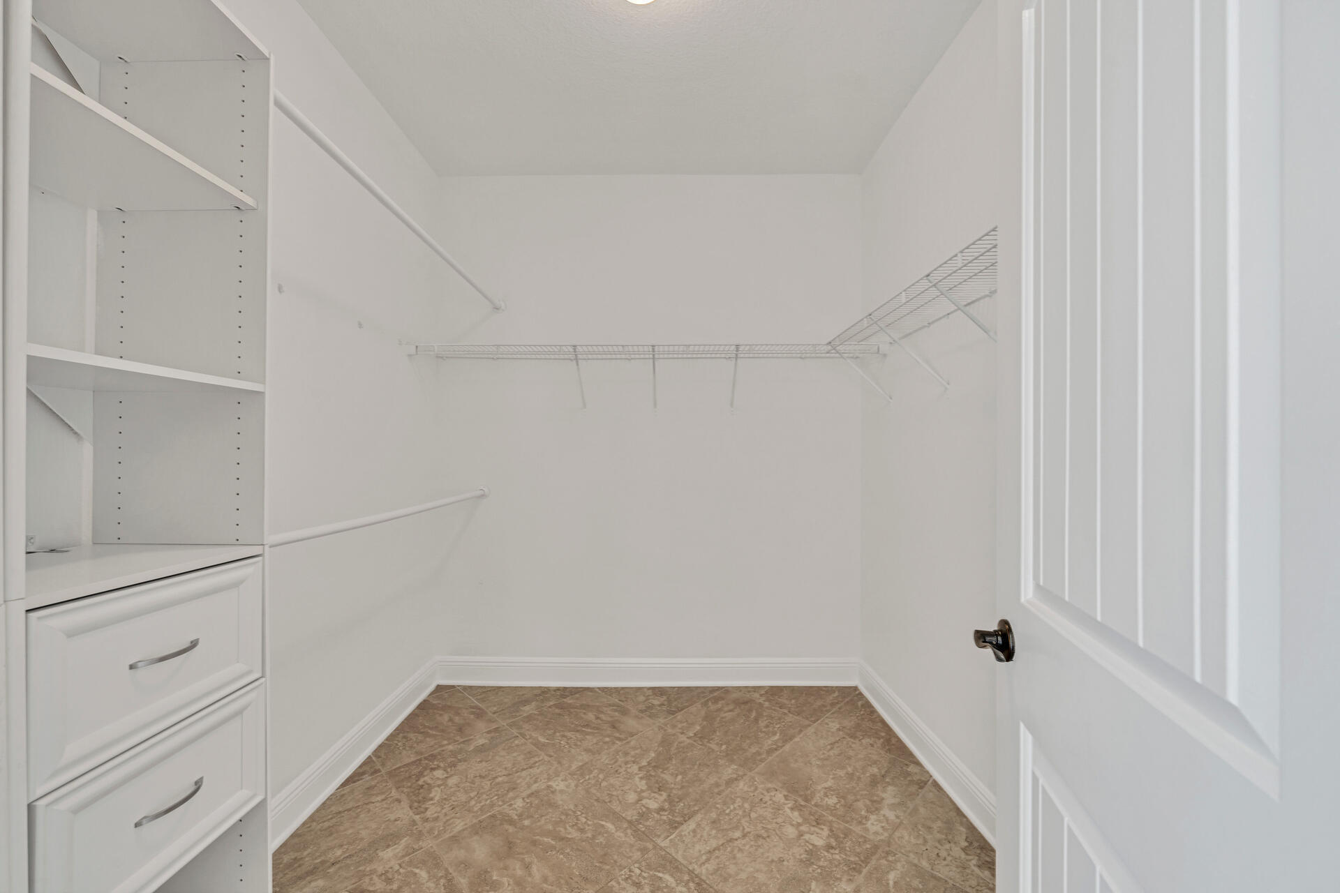 137 Lullaby Loop Santa Rosa Beach, FL 32459 - Photo 27 of 33 a view of an empty walk in closet