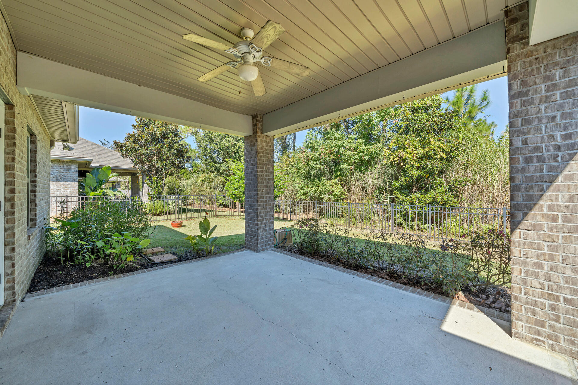 137 Lullaby Loop Santa Rosa Beach, FL 32459 - Photo 29 of 33 a view of a porch and garden