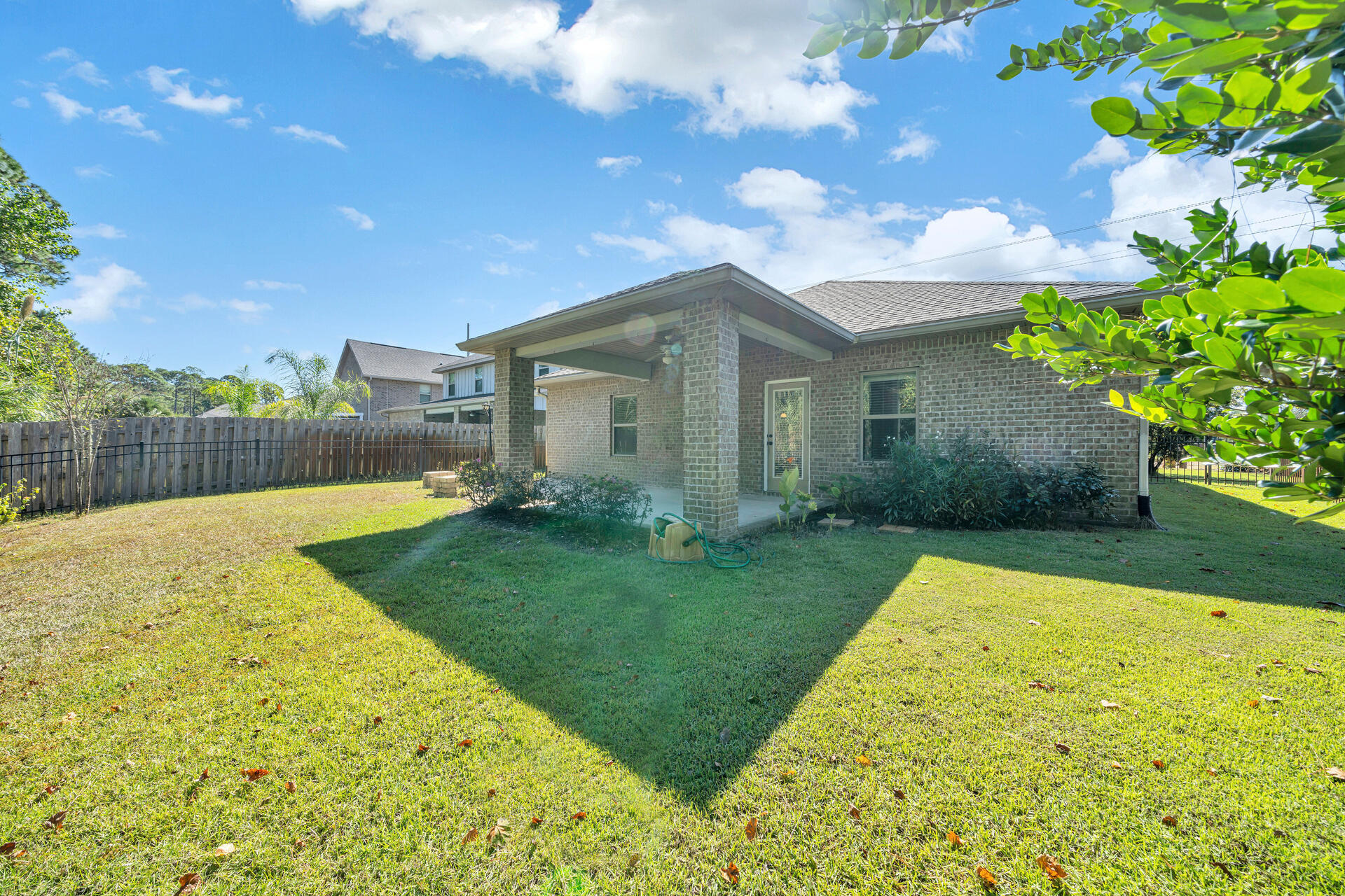 137 Lullaby Loop Santa Rosa Beach, FL 32459 - Photo 32 of 33 a view of backyard of house with green space
