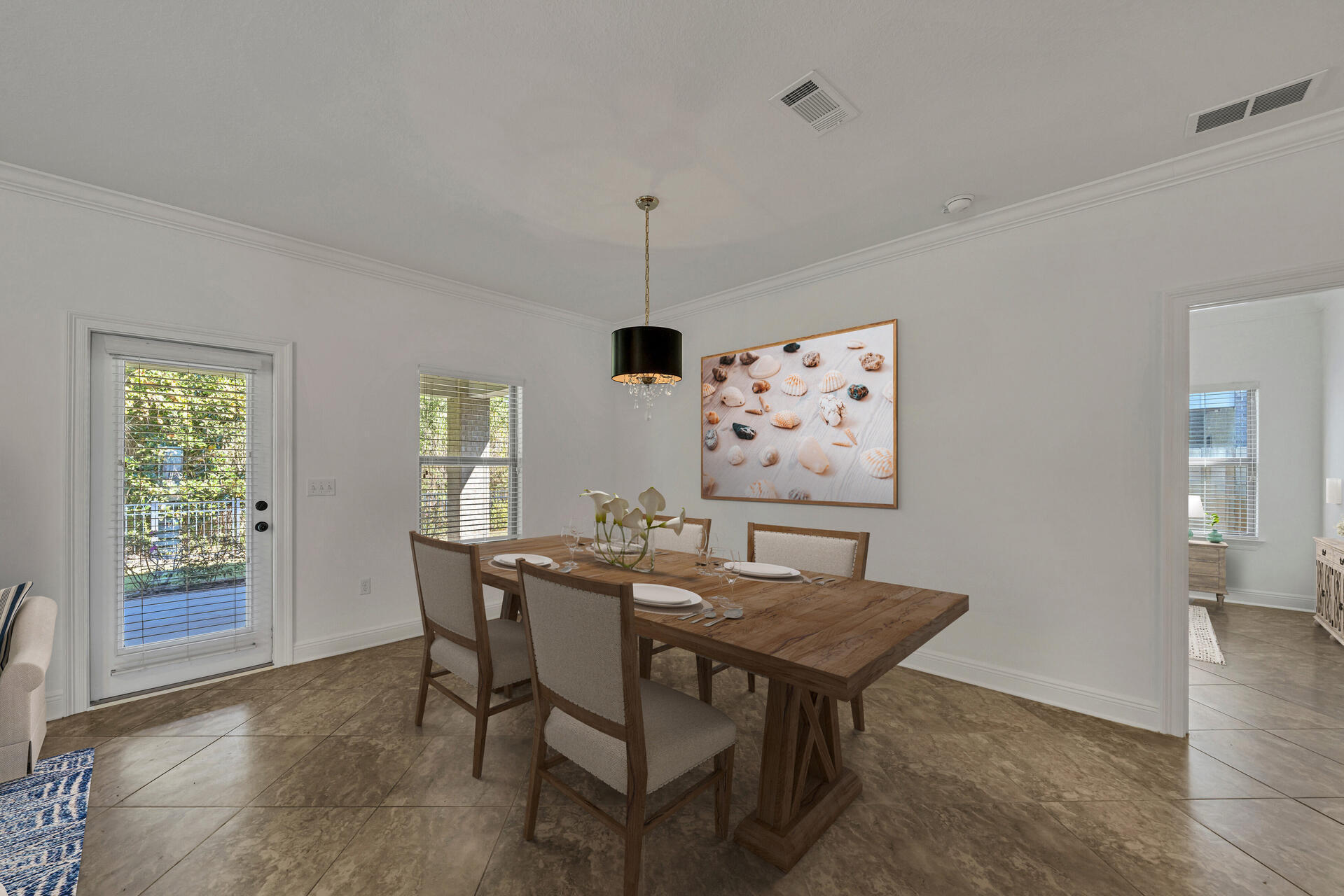 137 Lullaby Loop Santa Rosa Beach, FL 32459 - Photo 5 of 33 a view of a dining room with furniture and wooden floor