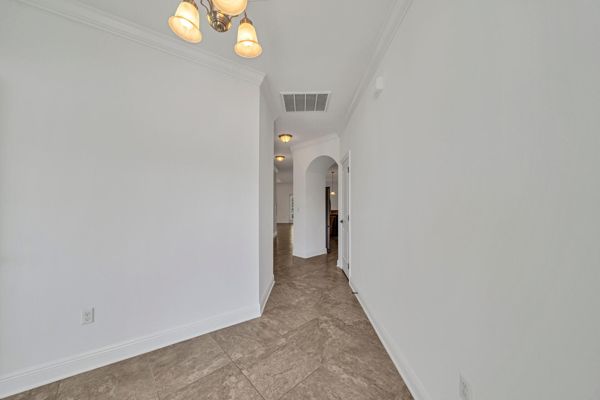 137 Lullaby Loop Santa Rosa Beach, FL 32459 - Photo 7 of 33 a view of a hallway with wooden floor