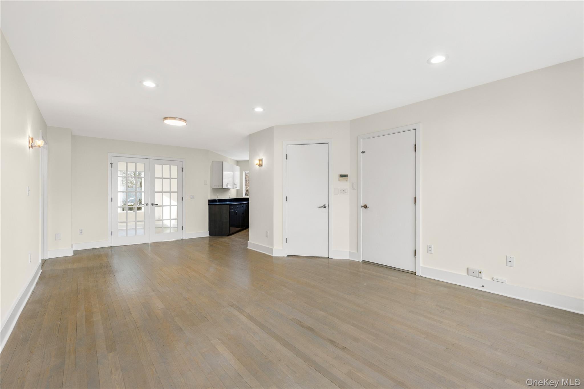 301 South Ridge Street, Unit 2 Rye Brook, NY 10573 - Photo 4 of 14 View of living/dining room towards office features beautiful HDWD floors. Second door (right side) is an XL walk-in closet