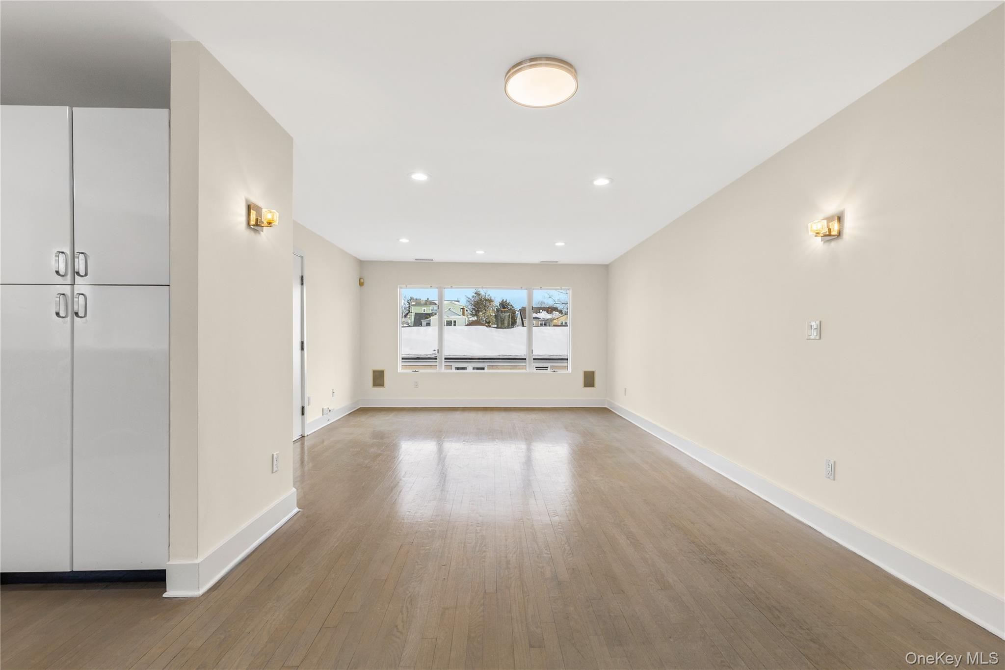301 South Ridge Street, Unit 2 Rye Brook, NY 10573 - Photo 6 of 14 Alternative view from kitchen towards dining/living area