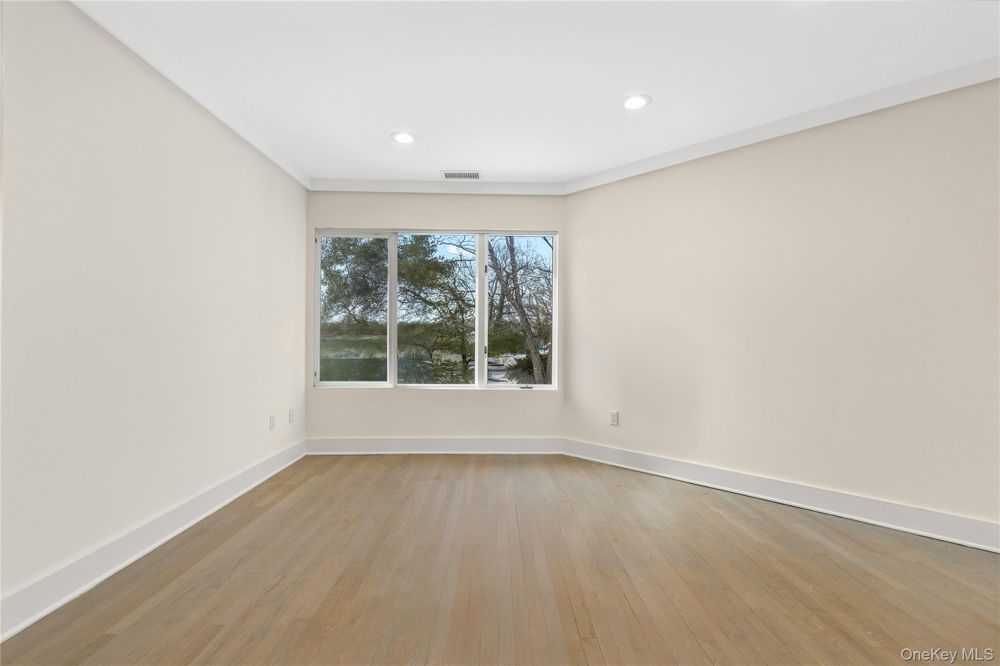 301 South Ridge Street, Unit 2 Rye Brook, NY 10573 - Photo 8 of 14 Home office features HDWD floors and glass doors for quiet working