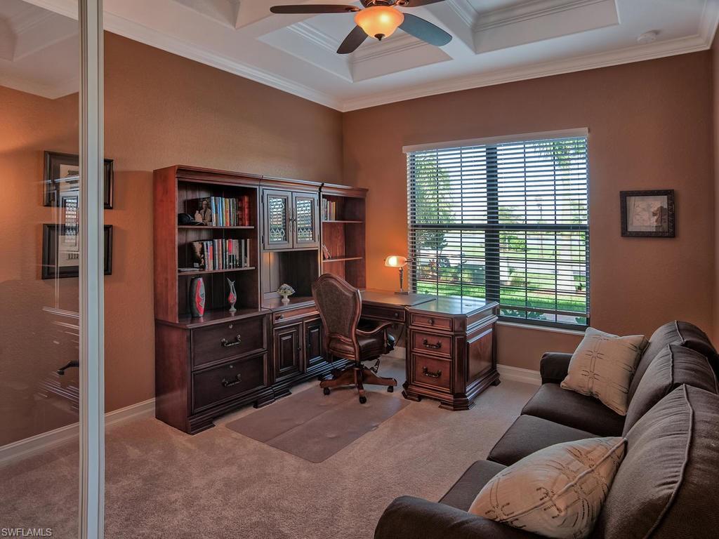 9634 Firenze Circle Naples, FL 34113 - Photo 9 of 35 a livingroom with workspace and a window