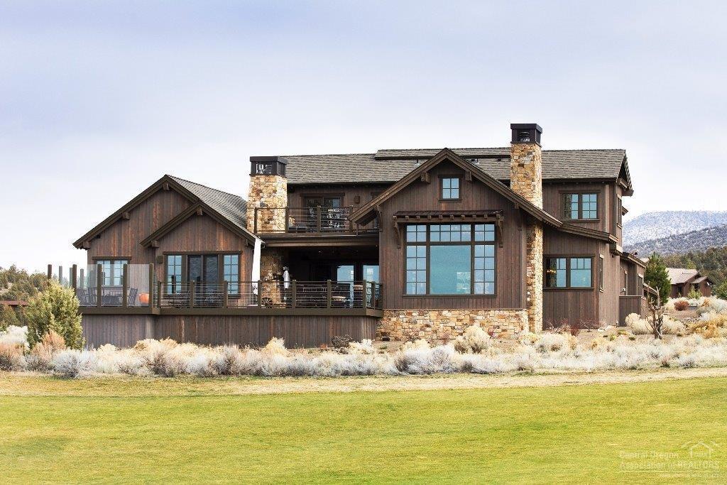 16163 South W Brasada Ranch Road Powell Butte, OR 97753 - Photo 20 of 24 a front view of a house with a ocean view