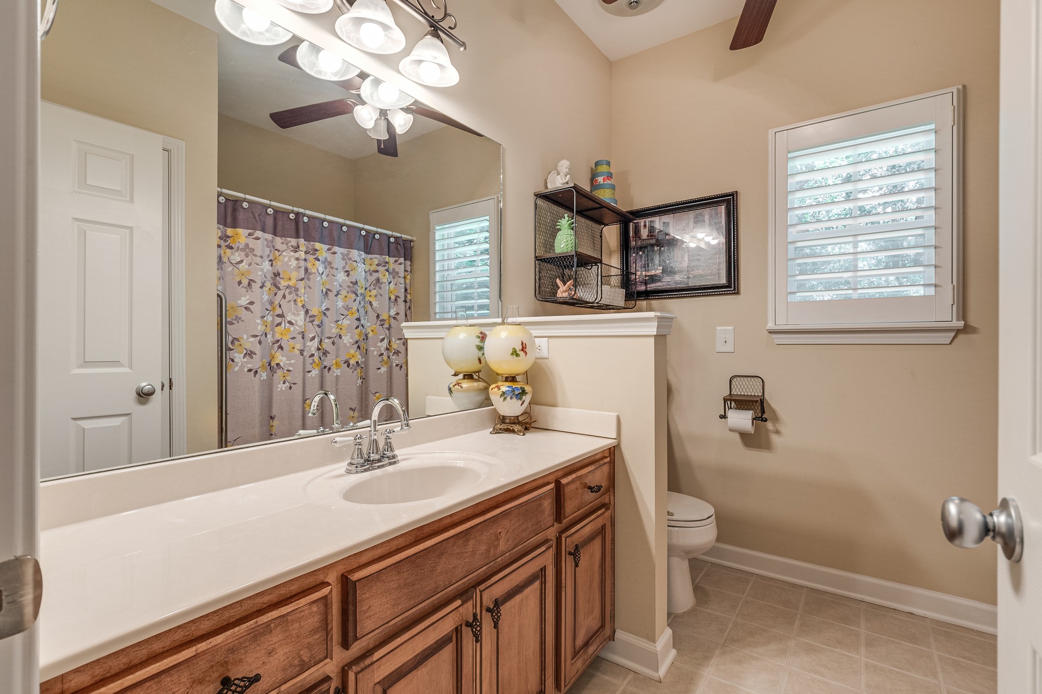 418 Coker Ford Road Portland, TN 37148 - Photo 35 of 38 a bathroom with a sink vanity and a mirror