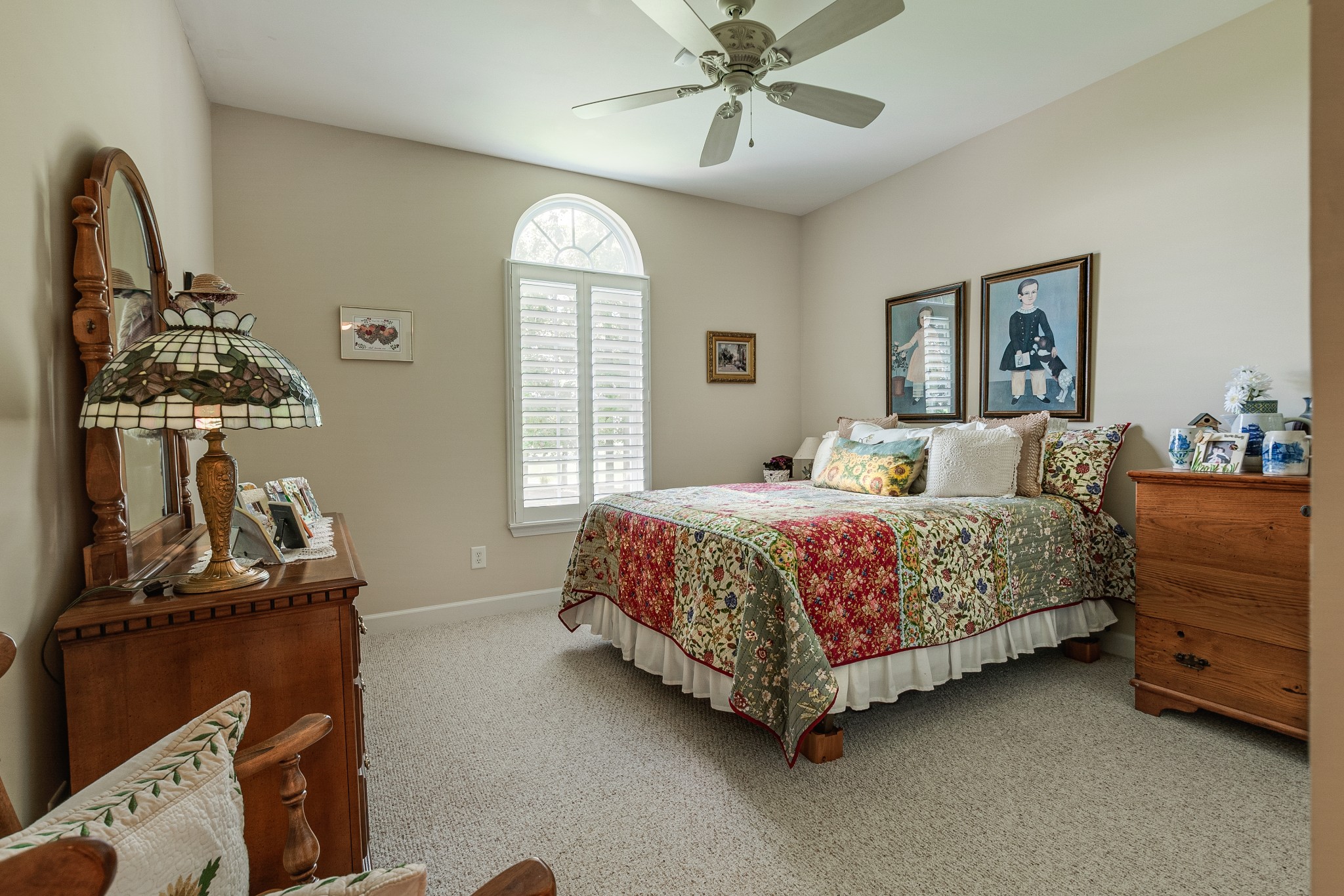 418 Coker Ford Road Portland, TN 37148 - Photo 36 of 38 a bedroom with a bed a dresser and window