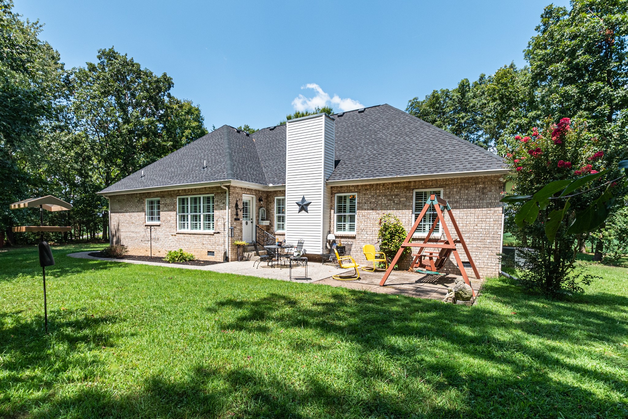 418 Coker Ford Road Portland, TN 37148 - Photo 5 of 38 a view of a house with backyard porch and sitting area