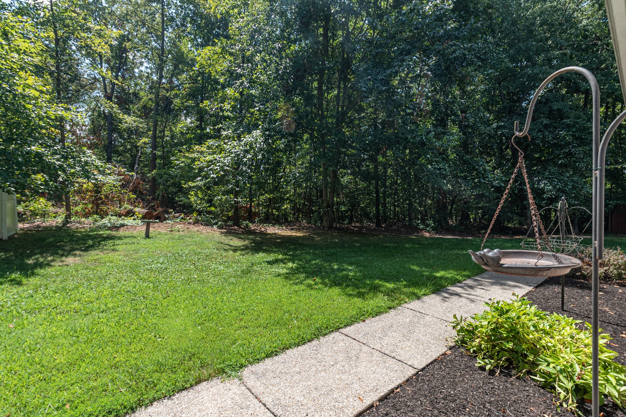 418 Coker Ford Road Portland, TN 37148 - Photo 8 of 38 a backyard of a house with table and chairs