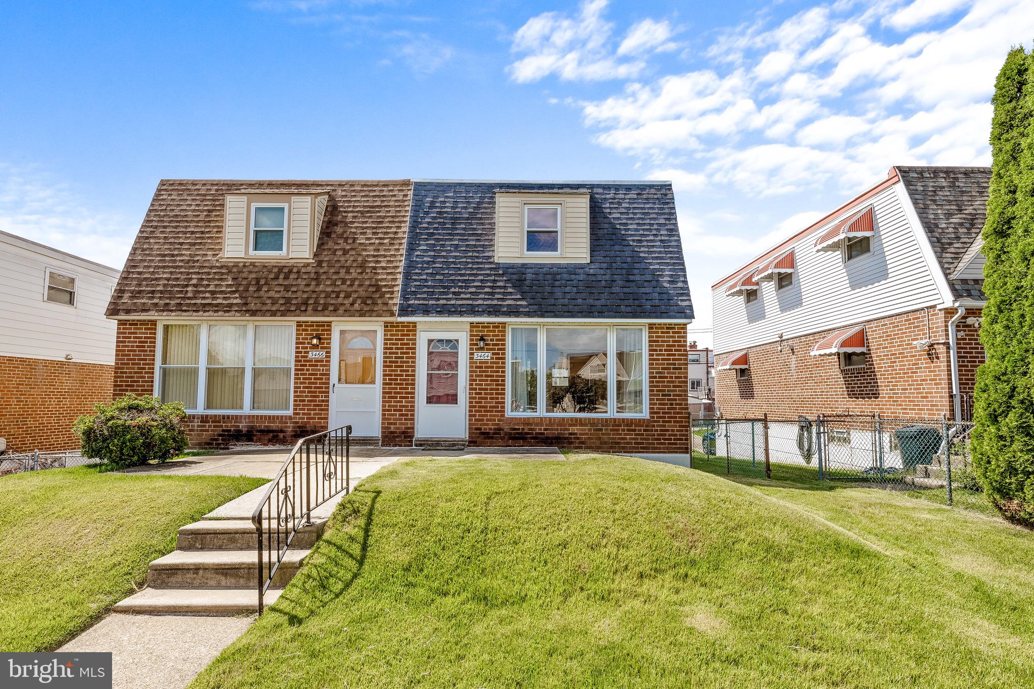 3464 Fitler Street Philadelphia, PA 19114 - Photo 1 of 22 a front view of a house with a yard table and chairs