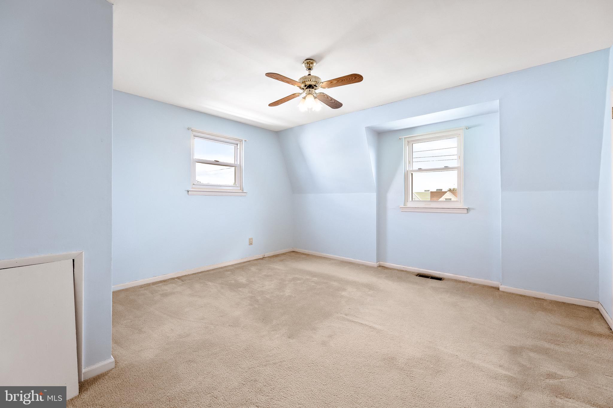 3464 Fitler Street Philadelphia, PA 19114 - Photo 14 of 22 an empty room with windows and fan