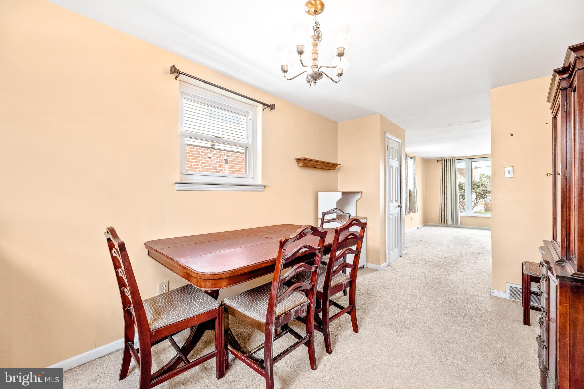 3464 Fitler Street Philadelphia, PA 19114 - Photo 5 of 22 a view of a dining room with furniture and chandelier