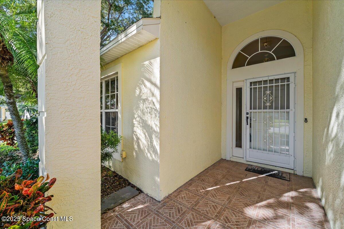 2798 Caitlin Court Melbourne, FL 32940 - Photo 16 of 27 a view of front door of the house