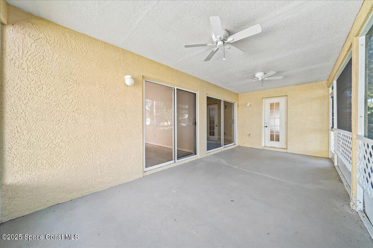 2798 Caitlin Court Melbourne, FL 32940 - Photo 23 of 27 a view of an empty room with a window