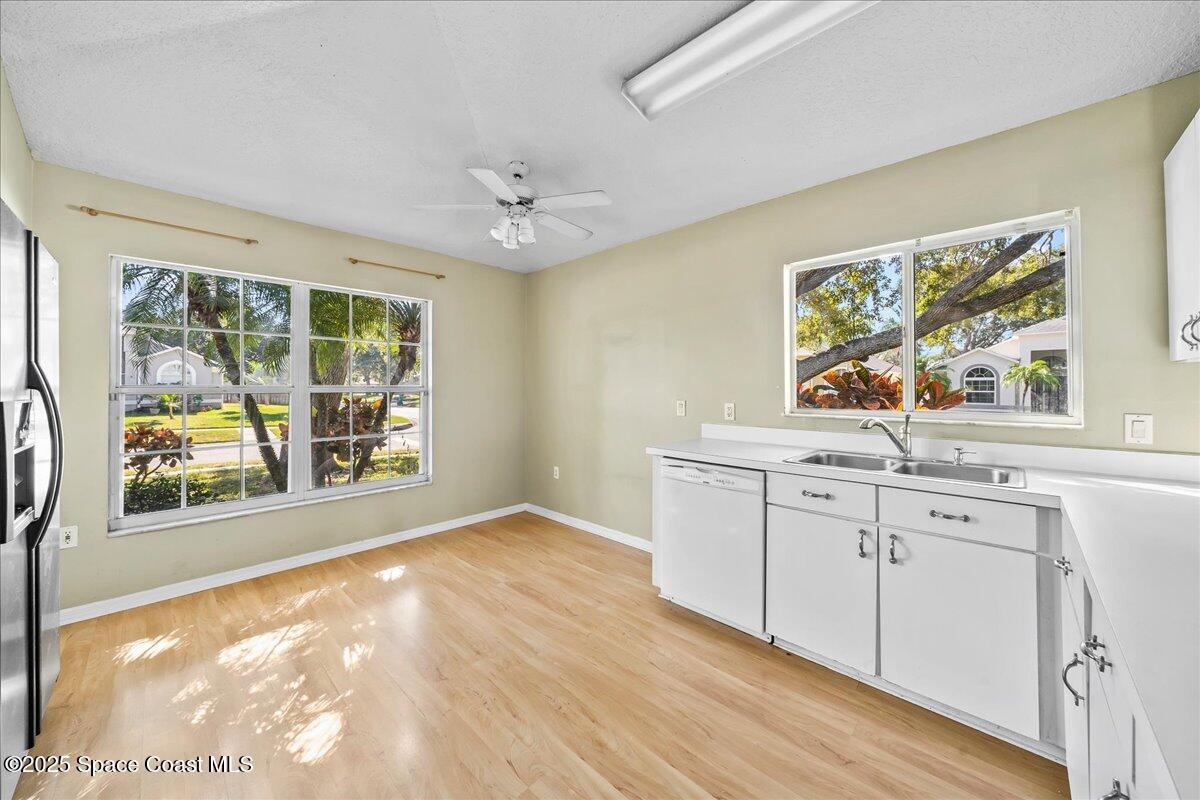 2798 Caitlin Court Melbourne, FL 32940 - Photo 4 of 27 a view of a kitchen with an empty space and window