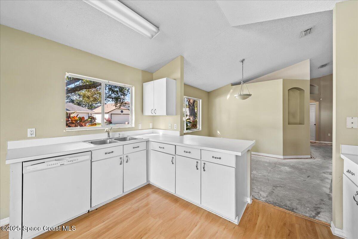 2798 Caitlin Court Melbourne, FL 32940 - Photo 5 of 27 a spacious bathroom with a shower sink and mirror