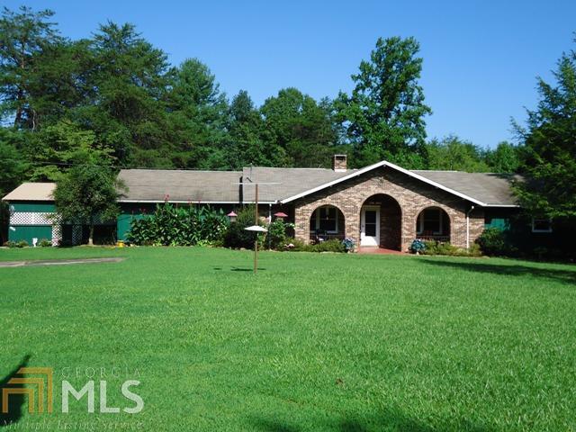 966 Dooley Road Clarkesville, GA 30523 - Photo 1 of 1 a front view of a house with garden