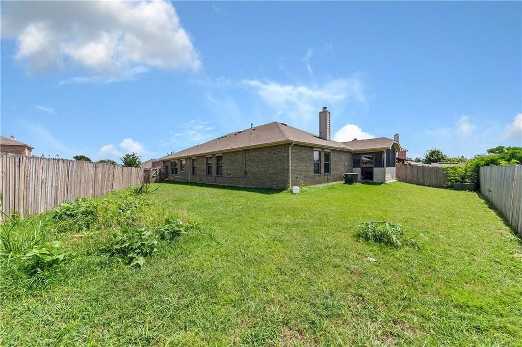 1404 Trading Post Drive Fort Worth, TX 76131 - Photo 25 of 25 a view of a house with a yard