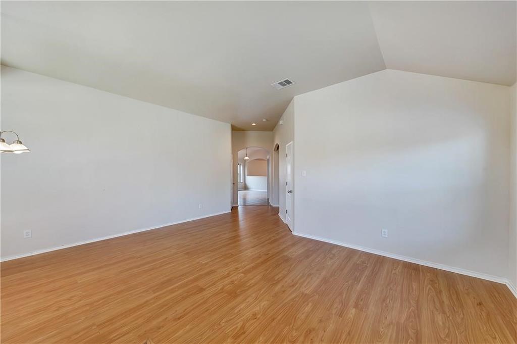1404 Trading Post Drive Fort Worth, TX 76131 - Photo 3 of 25 a view of empty room with wooden floor